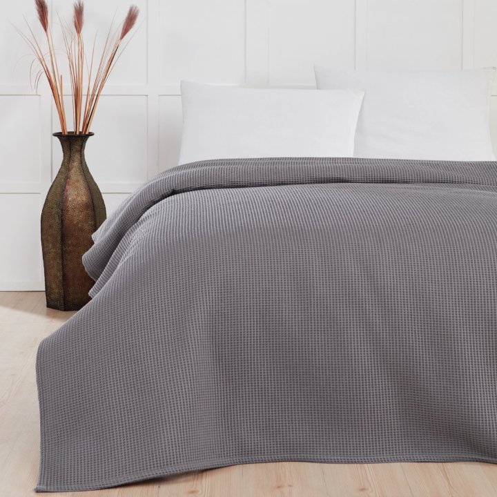 Hvad er forskellen p� et senget�ppe og en plaid?